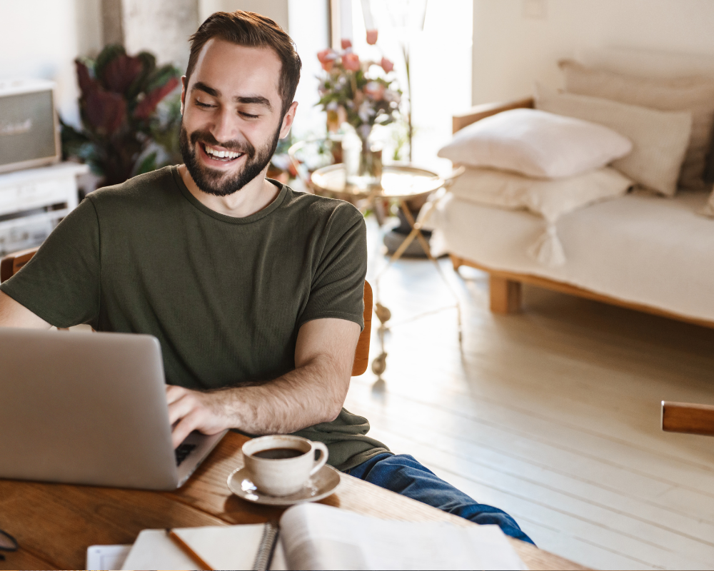 Male travel agent working from home
